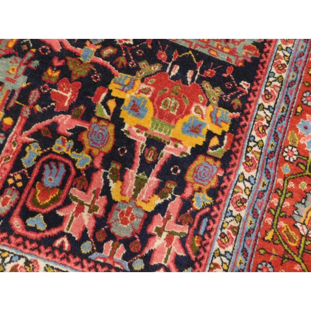 Floral motifs on blue background. 4'4"x 6'4"