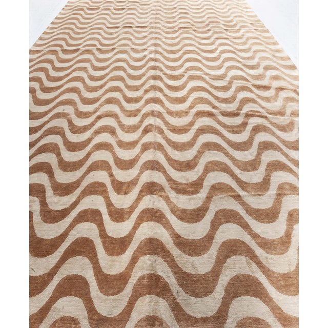Contemporary gold waves design handmade wool and silk rug by Doris Leslie Blau. Size: 9'0" × 14'8" (274 × 447 cm). ​The...