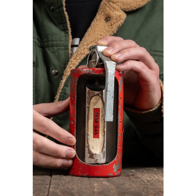 Vintage canister demonstrator. This piece was used to showcase the inner working of a throwable, combustable pressurized...