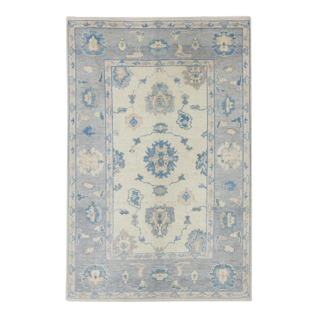 Early 21st Century Blue Floral Handwoven Wool Turkish Oushak Rug 4'10" X 7'7" For Sale