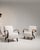 This piece carries genuine presence, its cream boucle upholstery immediately setting the tone for the piece. Originating...