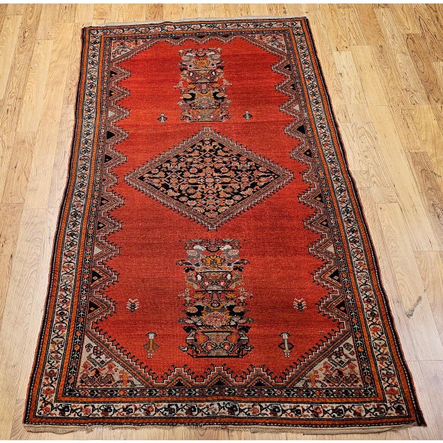 "This exquisite vintage Persian Malayer area rug, handwoven in the early 20th century (circa 1900–1925), is a rare and...