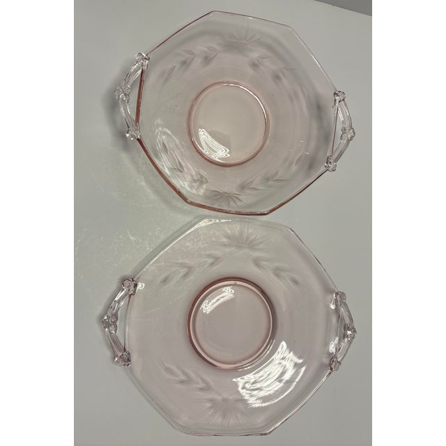 This elegant vintage serving set features a blush pink etched glass bowl with applied clear glass handles, accompanied by...