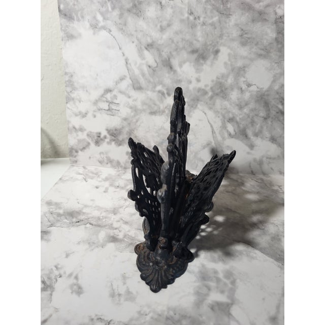 This is a stately and ornate Victorian style cast iron letter holder. This was an estate find and has no makers marks....
