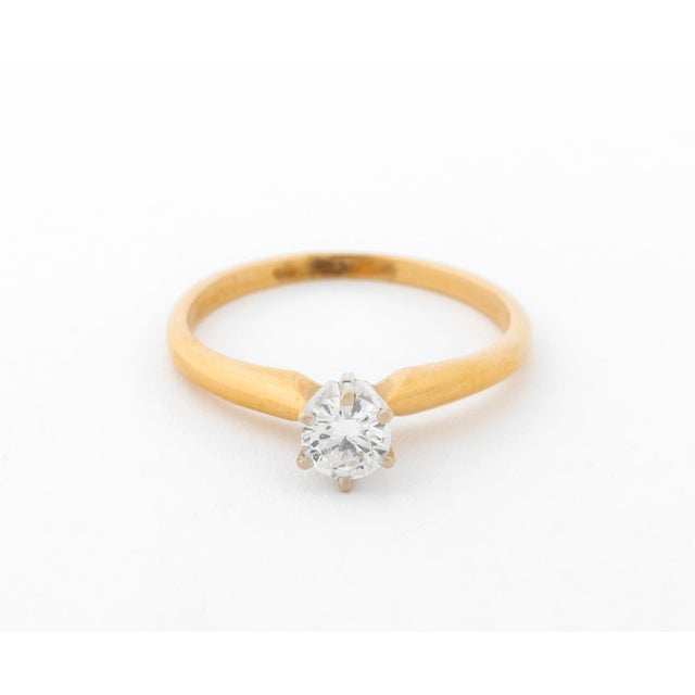 14K Yellow Gold and White Gold and Diamond Solitaire Engagement Ring, with one 0.37 carat round brilliant cut diamond,...