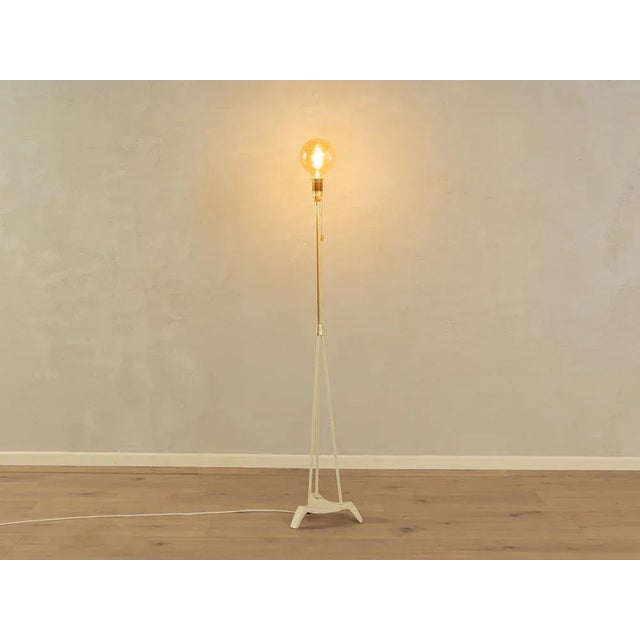 Classic floor lamp from the 1950s. High quality brass frame with cream -white base. The old lampshade was replaced by a...