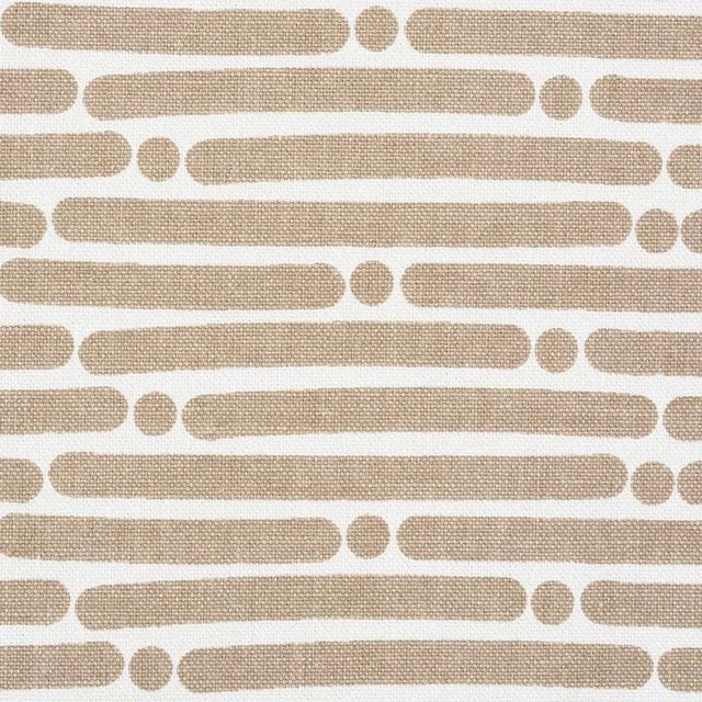 Painterly dots and dashes make up this rhythmic horizontal stripe. It's printed on sturdy Cotton and has loads of...