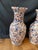 Striking pair of large vintage Japanese Imari porcelain floor vases, each standing an impressive 22 inches tall. Hand-...