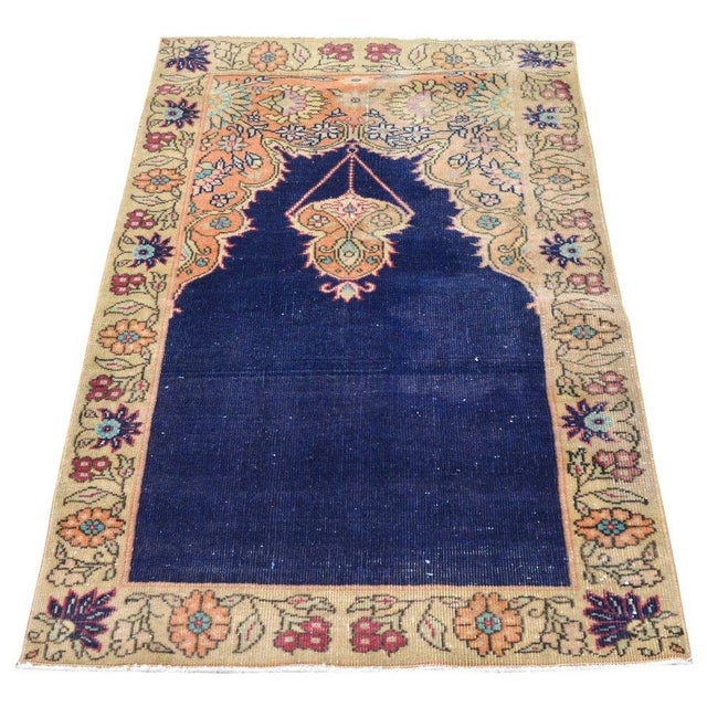 Hand-knotted with care using traditional rug-making techniques, this wool rug blends timeless craftsmanship with a modern...