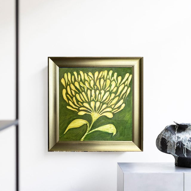 A striking and beautifully composed original painting featuring an oversized botanical flower rendered in warm golden...