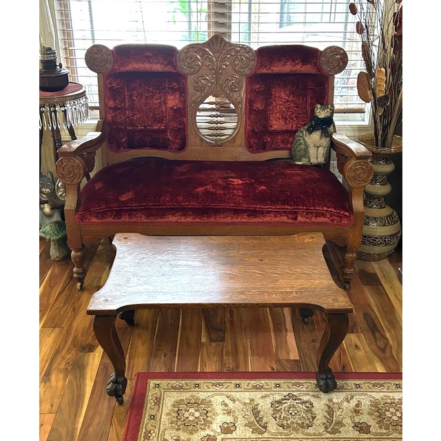 This is an antique, Tiger Oak, coffee table with carved Cabriole legs, and Eagle’s talon feet— all seated on top of tiny...