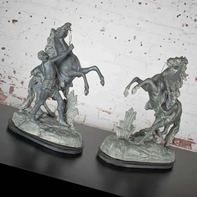 Fabulous antique replica spelter detailed sculptures of the Marly rearing horse and groom original stone sculptures by...