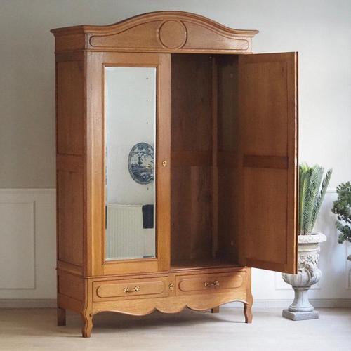 This French mirrored wardrobe dates from around 1900 and belongs to the furniture culture of the late 19th and early 20th...