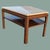 Bring timeless design into your home with this Mid-Century Modern side table in walnut and travertine. Design Highlights:...