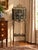 This is a truly striking example of a Gothic Revival telephone stand, attributed to the circle of Oscar Bach or Bertram...