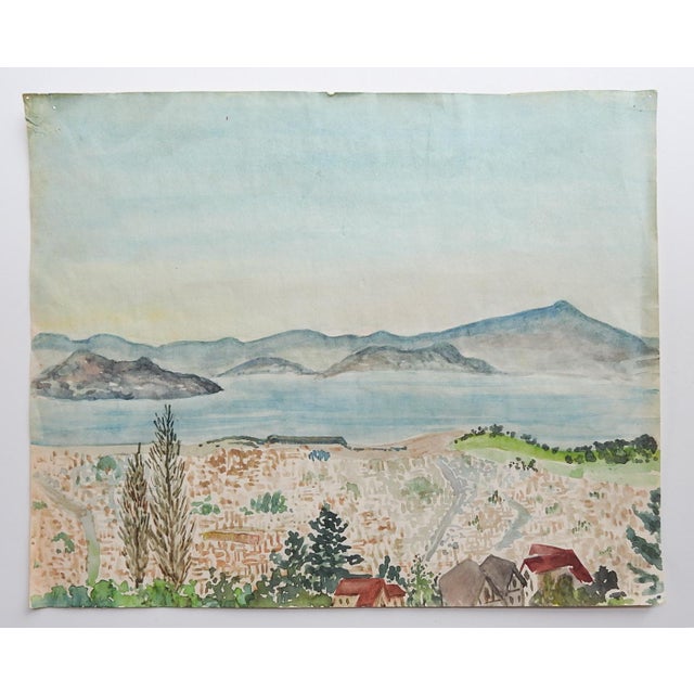 1958 watercolor on paper of a coastal landscape and town. Unsigned, pencil notation on verso "Tante Jo - from 15 Popy Lane...