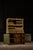 Green industrial sorting cabinet with 24 document drawers and sorting surface; also present is a large cabinet beneath....