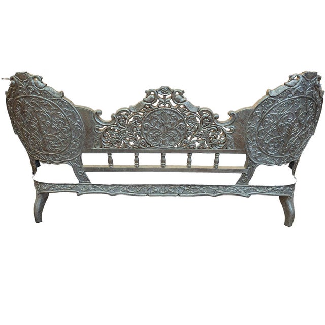 Step into a world of regal splendor and timeless heritage with this breathtaking Vintage Hand Carved Maharaja Sofa. Once a...