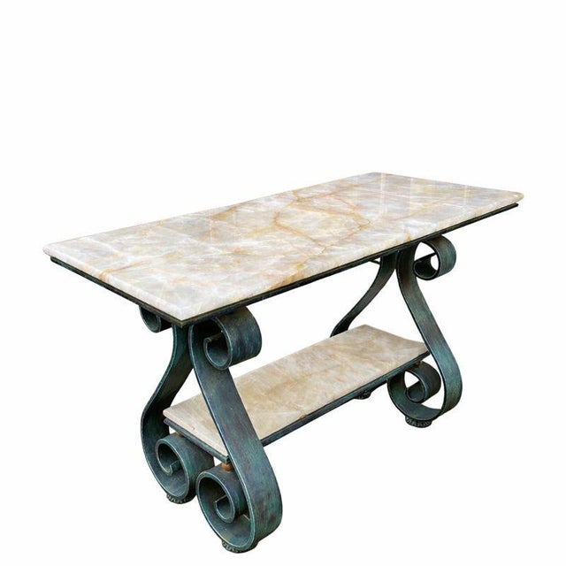 A sculptural console table designed by Parisian designer Jean-Rémy Couradette and produced by Deco Fero in France. The...