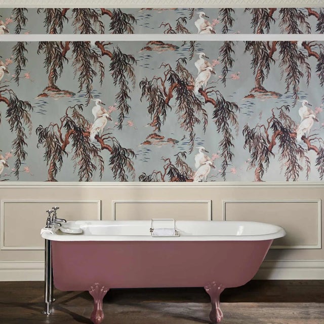 Capturing a tranquil scene in nature, the 'ZEUS' wallpaper features painterly cranes, weeping willows and delicate flowers...