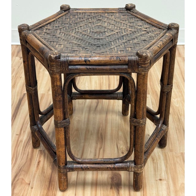 Gorgeous vintage hexagonal burnt tortoise shell finish rattan side table with basketweave top. Rich detail to finish and...