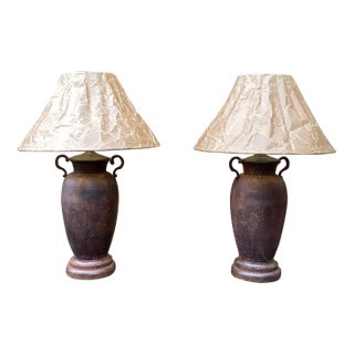 Pair of Late 20th Century Rusted Urns Mounted as Lamps With Crinkled Parchment Shades For Sale