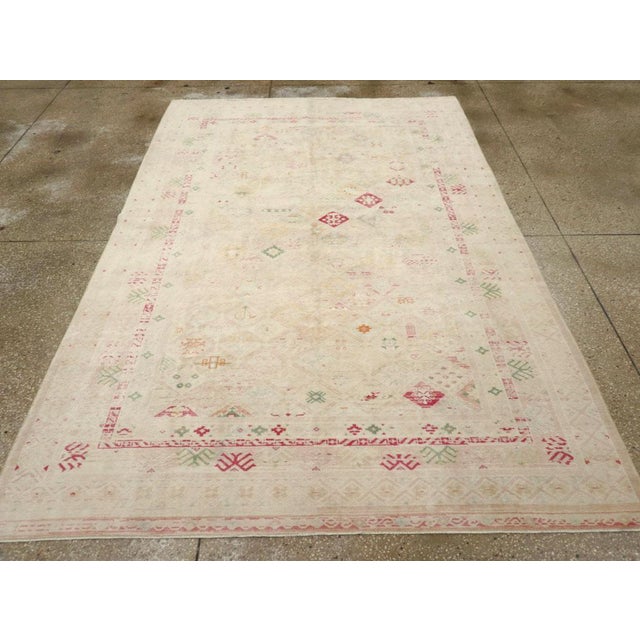 A vintage Turkish Anatolian accent rug handmade during the Mid-20th century. Measures: 6' 3" x 9' 3"