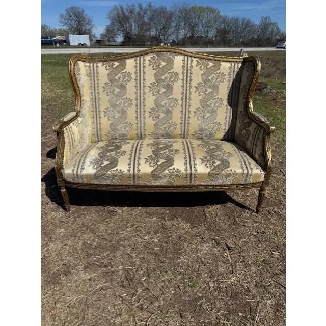 A Fine 19th century Louis XVI-style Settees featuring classic "medallion" fluted tapered legs, and carved rosette details....