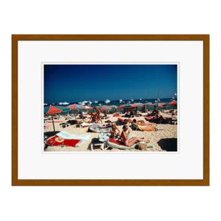 Contemporary Beach at Saint Tropez 1977 by Slim Aarons Brown Framed C-Print For Sale