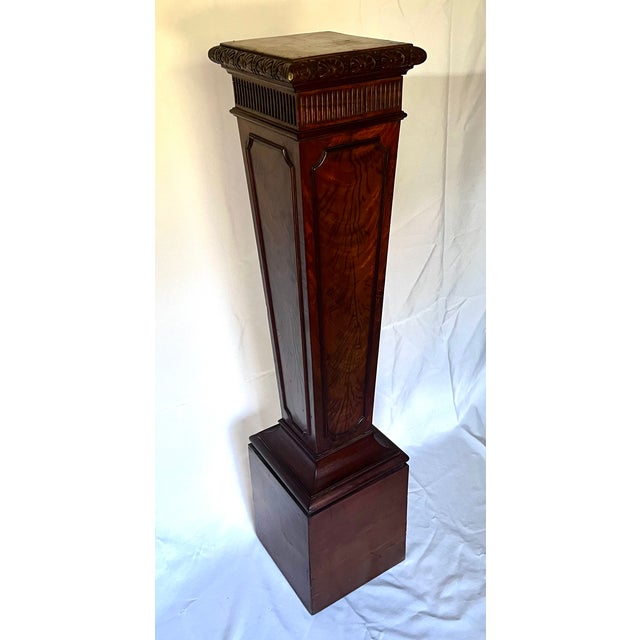 Elevate your favorite sculpture, bust, or floral arrangement with this striking 19th-century Georgian-style mahogany...
