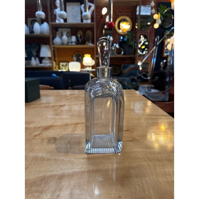 The Vintage Italian Decorative Crystal Decanter from the 1960s is a classic and refined piece of barware. Crafted in Italy...