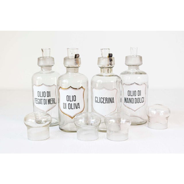 36 Italian pharmacy jars from the 20th century made of either white porcelain or glass and sold individually. Immerse...