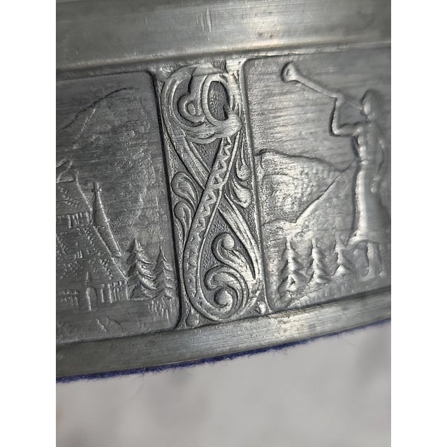 This vintage Norwegian ceremonial bowl has detailed scenes engraved in each panel. It looks to be the design of Konge...