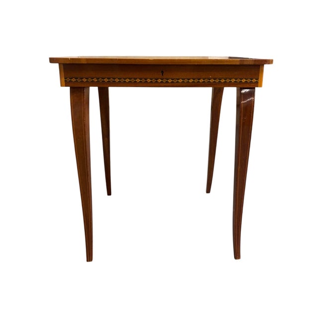 Unmarked wooden Italian game side table with a satinwood inlaid marquetry top, cabriole legs, and a hinged checkered lid...