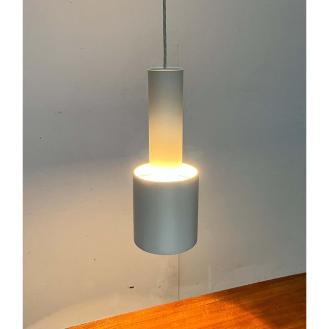 A rare version of the a110 pendant lamp by louis poulsen, based on a design by alvar aalto from the early 1950s. a...