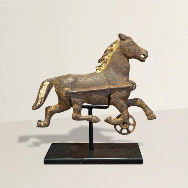 This early 20th-century cast iron running horse captures motion in its most distilled, industrial form—an object once...