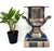 A silver plate trophy urn / champagne bucket with a flared rim, pedestal base, and ornate floral handles. The front is...