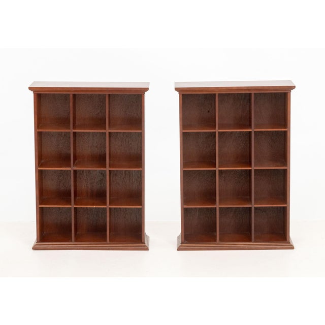 Pair of Modern Cherry Finished Wood Pigeon Hole Bookcases, each with twelve cube compartments and The Bombay Company marks...