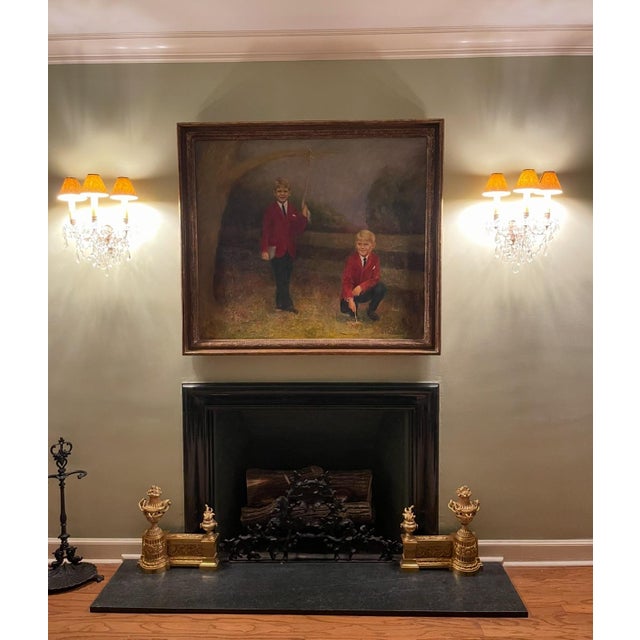 A fine and large original painting by a Mississippi Delta artist, depicting a pair of young boys in red blazers amongst a...