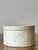 Embrace the raw, elemental beauty of natural stone with this exquisite vintage travertine lidded box. Masterfully carved...
