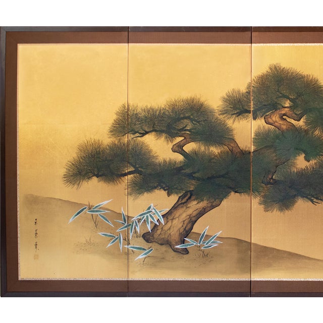 Beautiful vintage Japanese 4-panel painted Byobu (folding screen) "Evergreen Pine Tree" on gold background. Signed and...