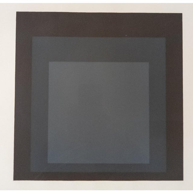 We are selling this dark and moody Mid Century Modern serigraph by Josef Albers. This silkscreen features three black and...
