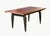 A stylised inlaid Rosewood Dining Table with a well-figured book-matched top in rosewood veneer (Dalbergia stevensonii /...