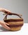 This mid 20th century basket from United Kingdom is finished in tan, worked in wicker. Its form follows honest, well-...