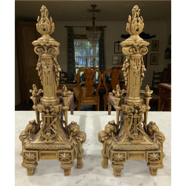 Exceptional pair of antique French-style chenets, or fireplace andirons, dating approximately to the late 19th or early...
