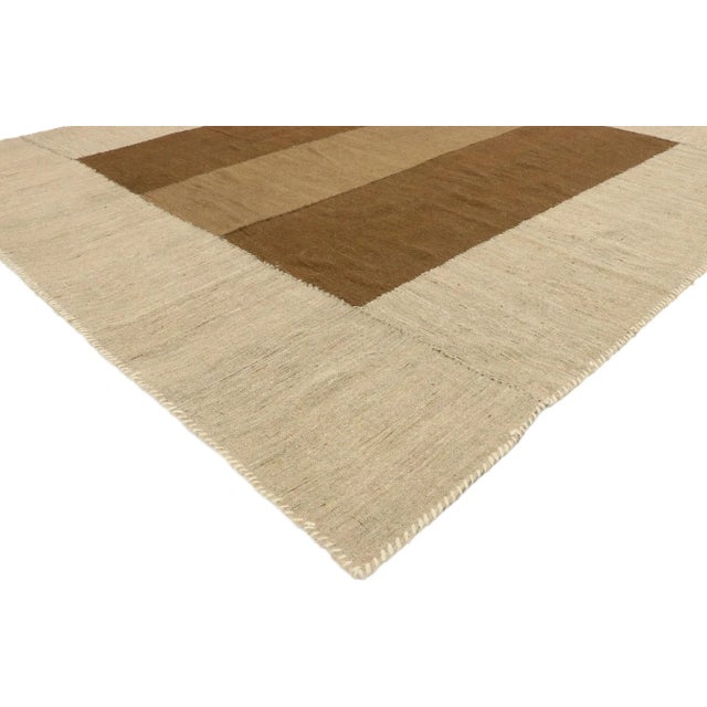 76386 Vintage Persian Kilim Area Rug with Mid-Century Modern style, Flat-weave Kilim Rug 06'01 x 06'10. Balancing a...