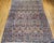 "This rare near-square vintage Persian Kerman Lavar rug, woven in the first quarter of the 1900s, showcases a remarkable...