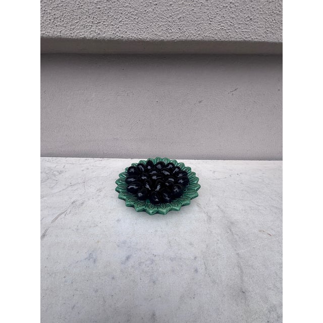Portuguese Majolica Palissy Olives Platter signed Aires Constantino Leal Caldas Da Rainha. Circa 1940. 5.5 inches diameter.