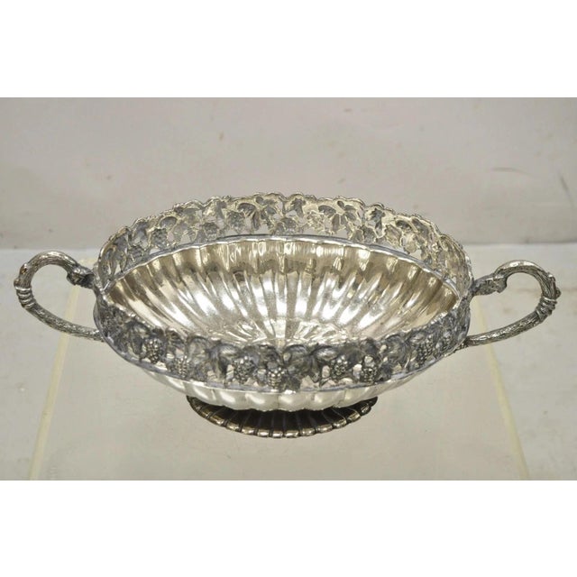 Antique Victorian Silver Plated Grapevine Oval Twin Handle Centerpiece Fruit Bowl. Item features Pierced grapevine...