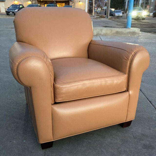 Art Deco style leather club chair model “Harbison” by Hancock and Moore, signed.